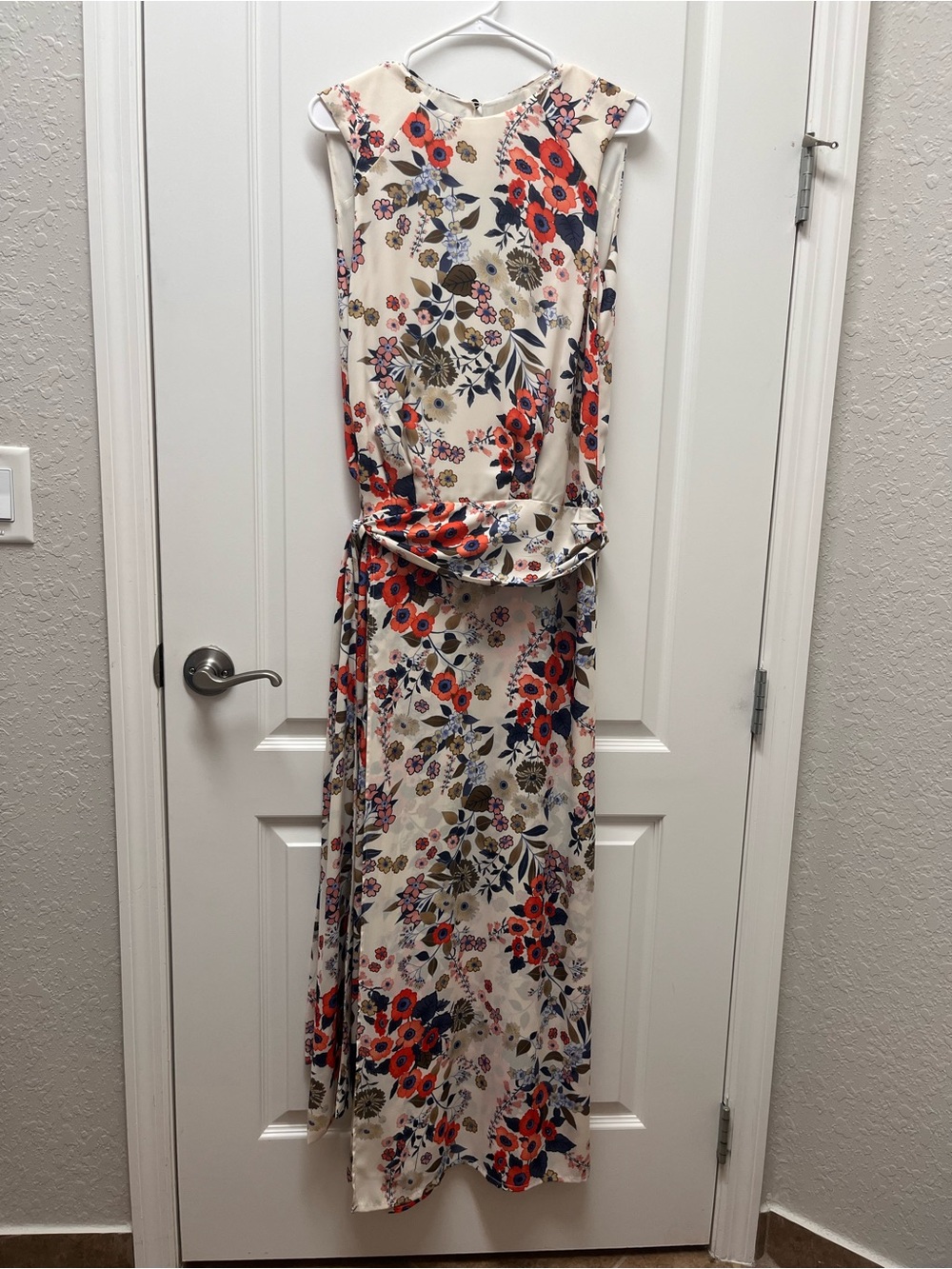 Sleeveless Cream Maxi Dress with Red Floral Print and Tie Waist